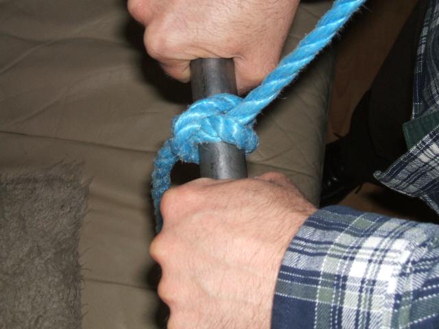 Rope tie knot Closeup. Rope with a two tied knot in the middle